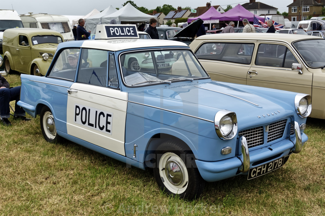 "1963 Triumph Herald Saloon 1200 police car" by Andrew Harker - $15.16 "1963 Triumph Herald Saloon 1200 police car" stock image