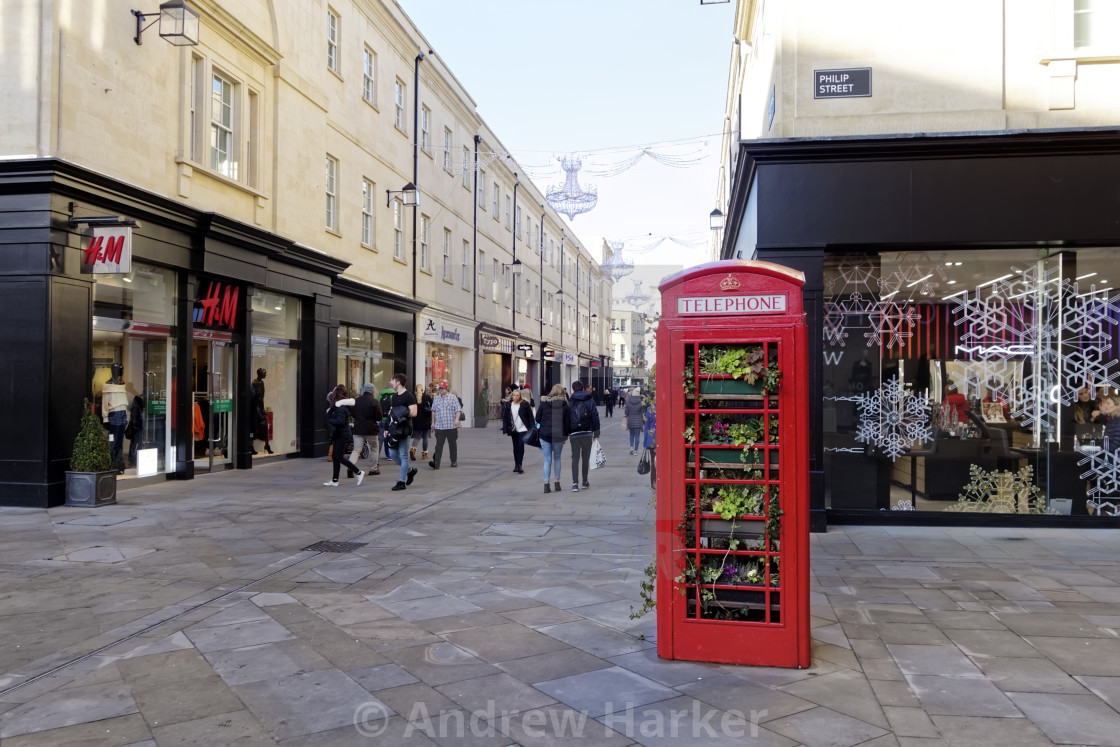 "Traditional red telephone box filled with flowers" stock image