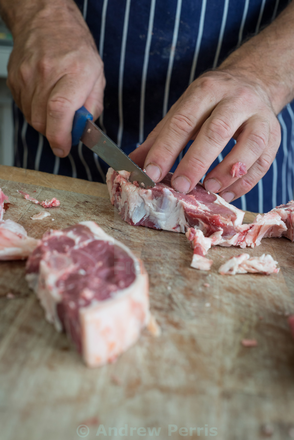Cutting Raw Meat With A Sharp Knife License Download Or Print For 12 40 Photos Picfair