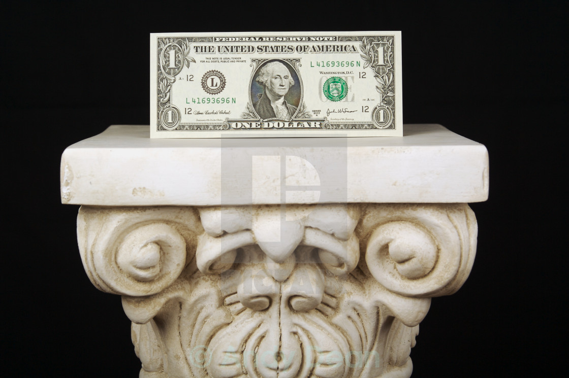 The Almighty Dollar One Dollar Bill On A Pillar With A Black