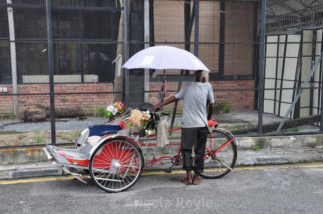 "Trishaw rider" stock image