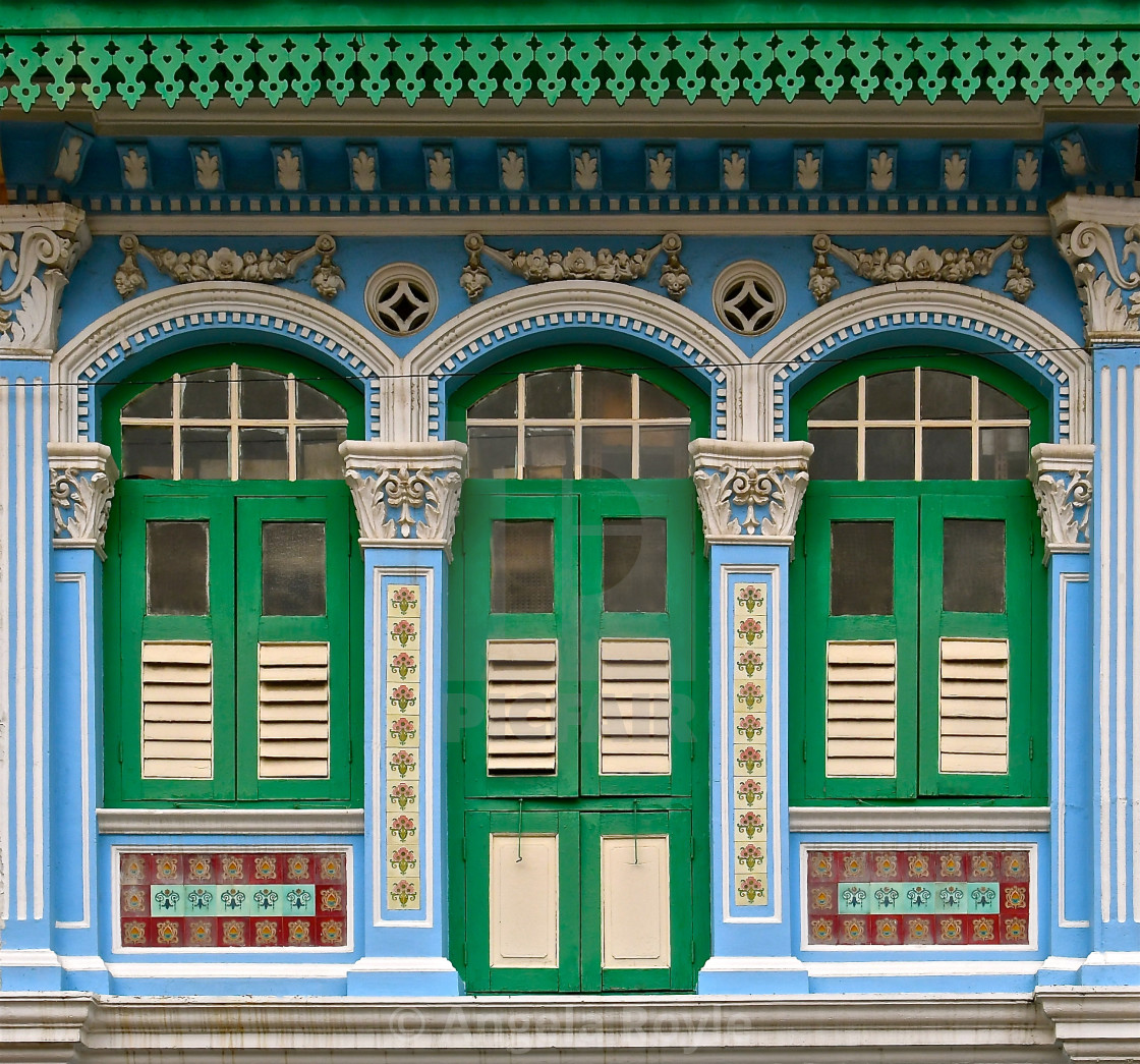 "Blue and green pernanakan shop house" stock image