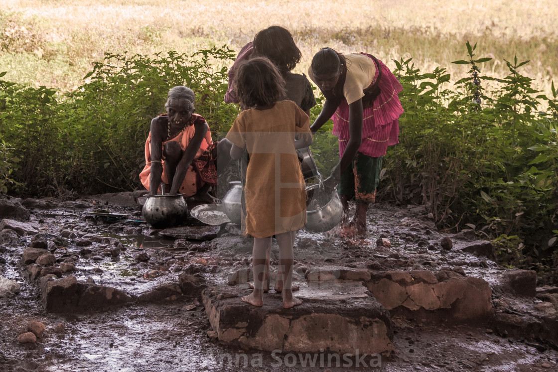"at the water pump" by Anna Sowinska - $5.08 "at the water pump" stock image