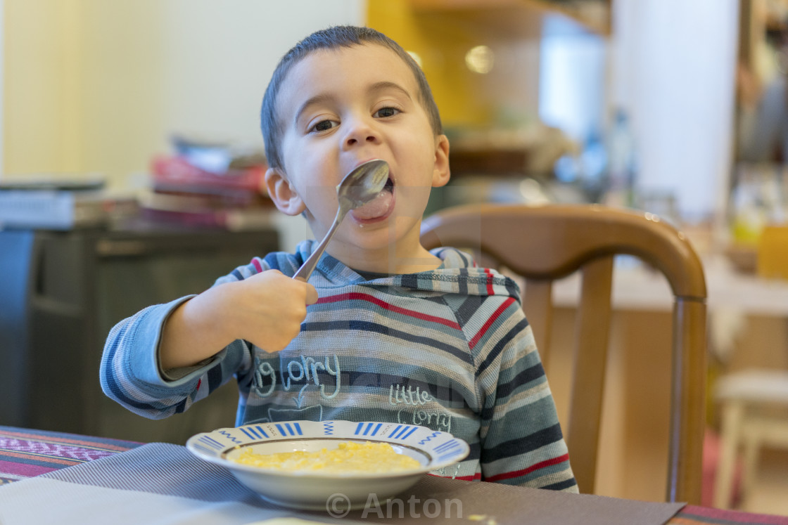 Funny Baby Eating Porridge Happy Infant Baby Boy Spoon Eats