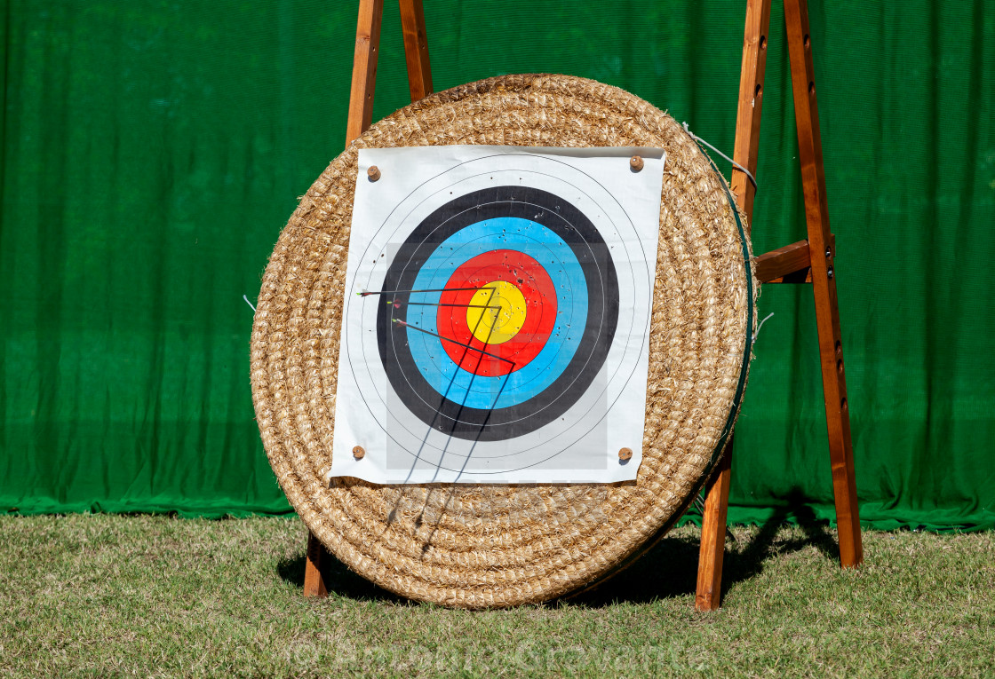 "Arrows embedded in row of archery targets." by Antonio Gravante - $10.72 "Arrows embedded in row of archery targets." stock image
