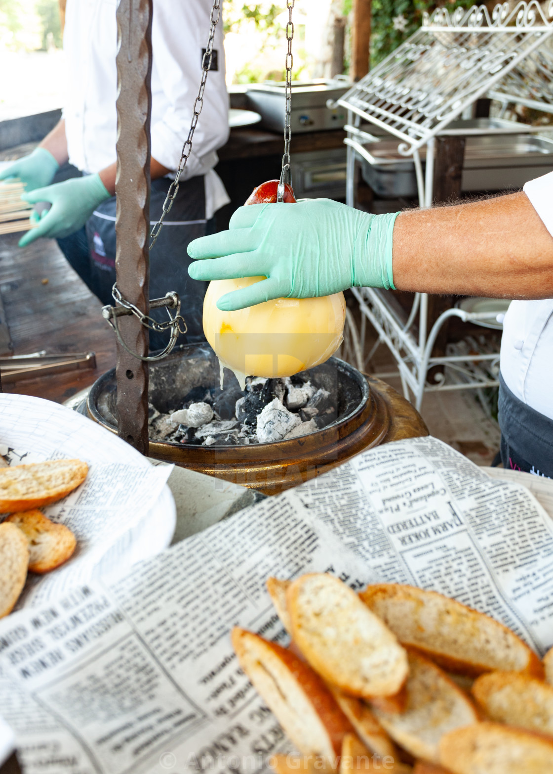 "Baked melted cheese called Caciocavallo over the hot coals." by Antonio Gravante - $10.72 "Baked melted cheese called Caciocavallo over the hot coals." stock image
