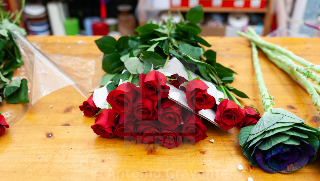 "Red roses are on the counter in the flower shop." by Antonio Gravante - $10.72 "Red roses are on the counter in the flower shop." stock image