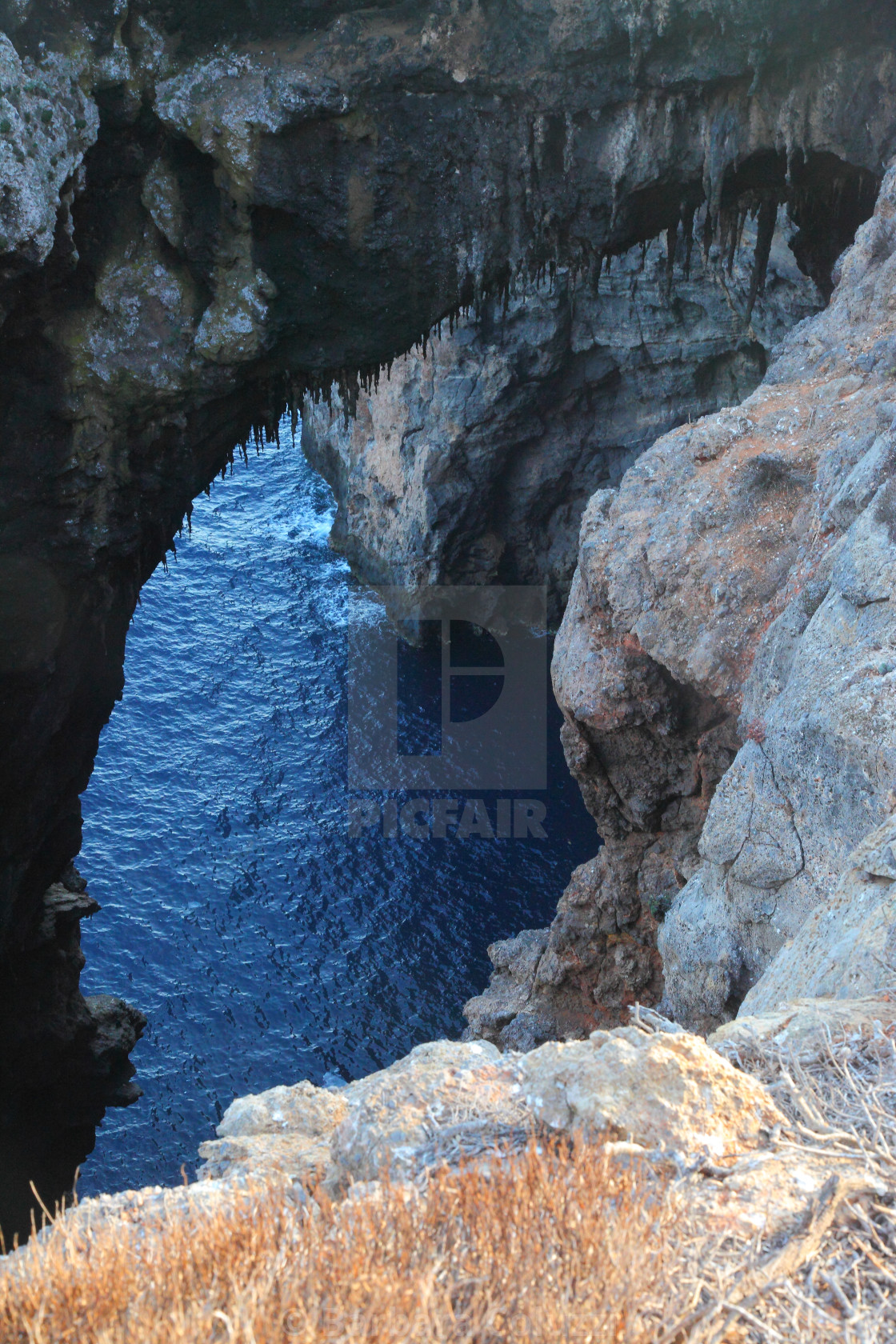 "Giannutri, Argentario: A Grottone (big cavern) against the background of the sea 1)." stock image