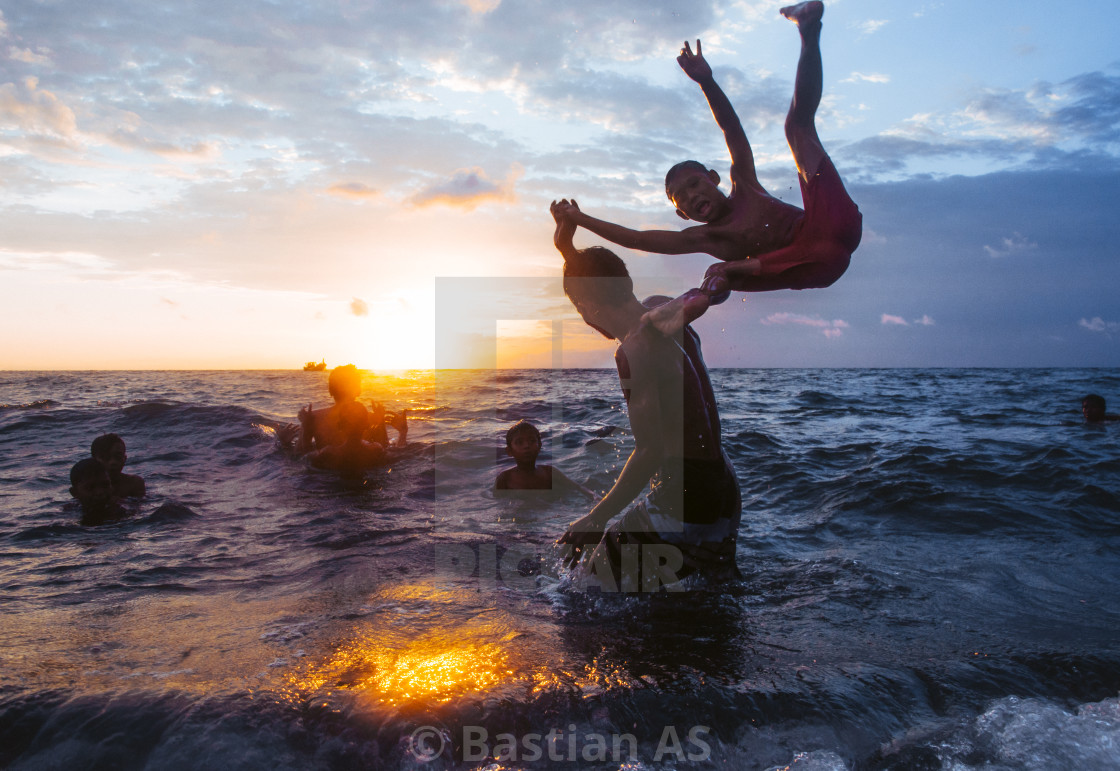 "Playing on the beach" stock image