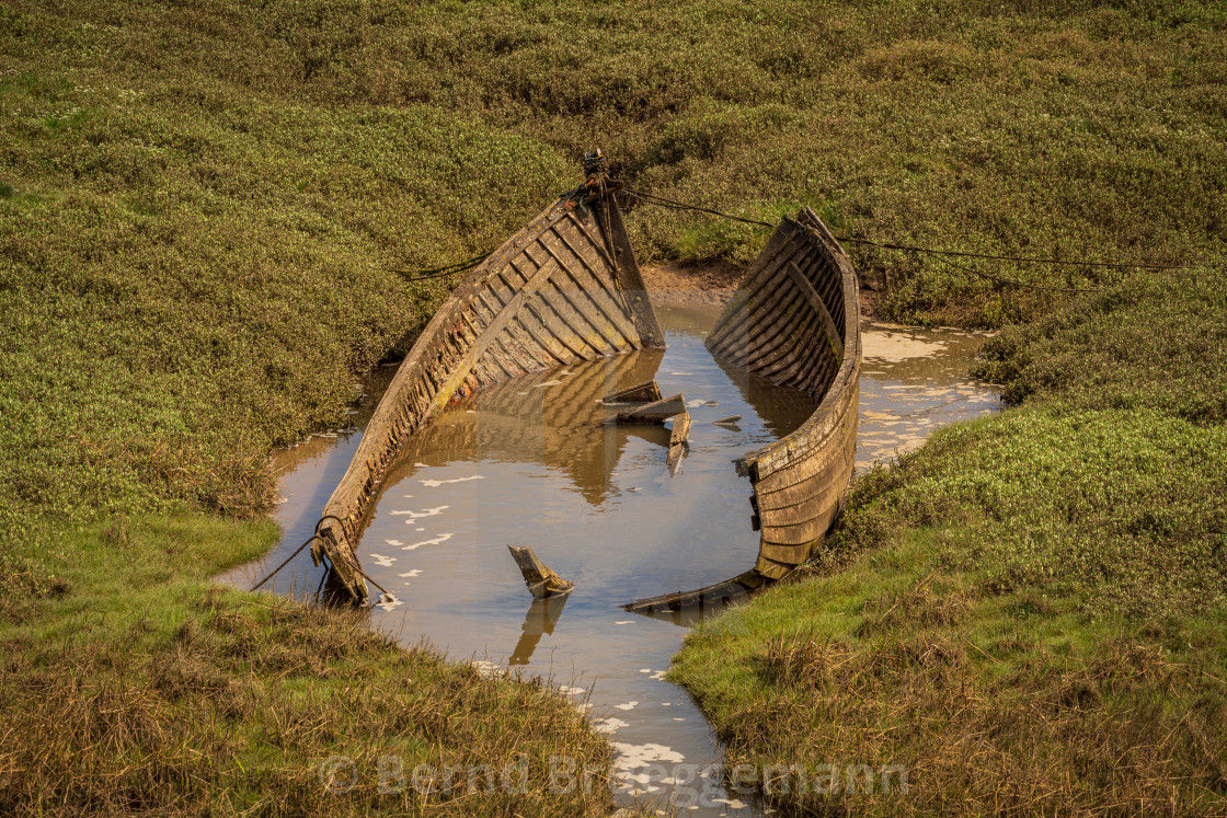 "A damaged Boat in the grass, seen in Askam-in-Furness, Cumbria," stock image