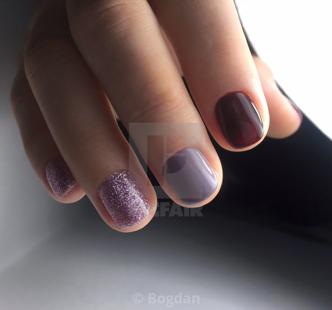 Manicure of different colors on nails. Female manicure - License, download or print for £ | Photos | Picfair Manicure of different colors on nails. Female manicure - License, download or print for £ | Photos | Picfair