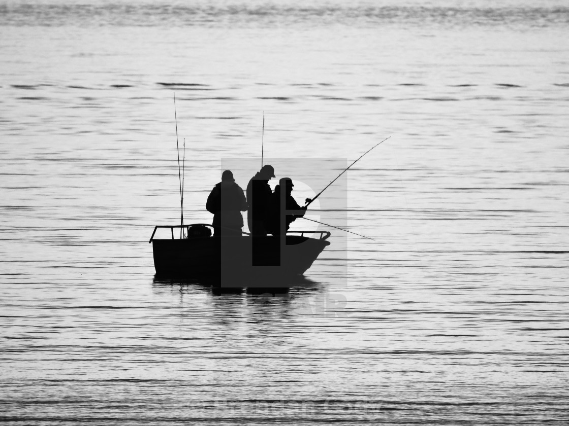 "Fishing Silhouette (Arctic Circle)" stock image