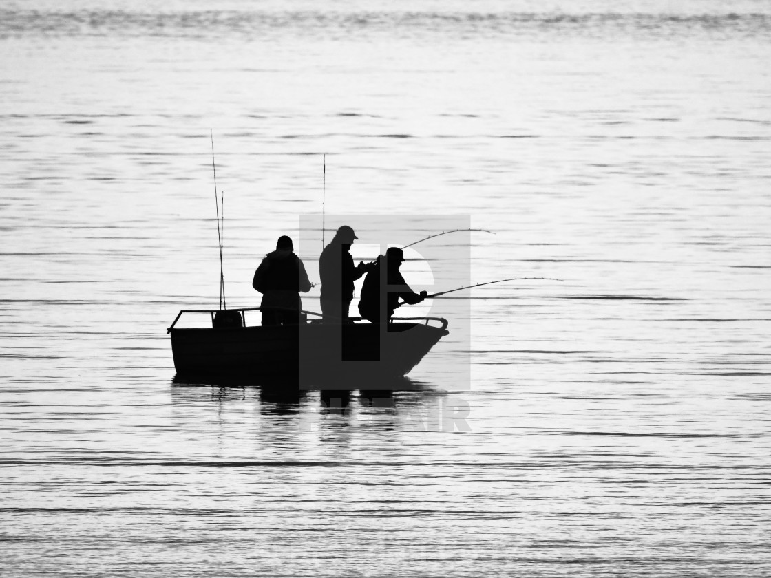 "Fishing Silhouette (Arctic Circle)" stock image