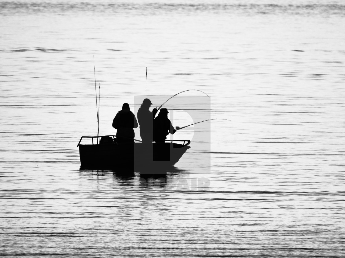 "Fishing Silhouette (Arctic Circle)" stock image