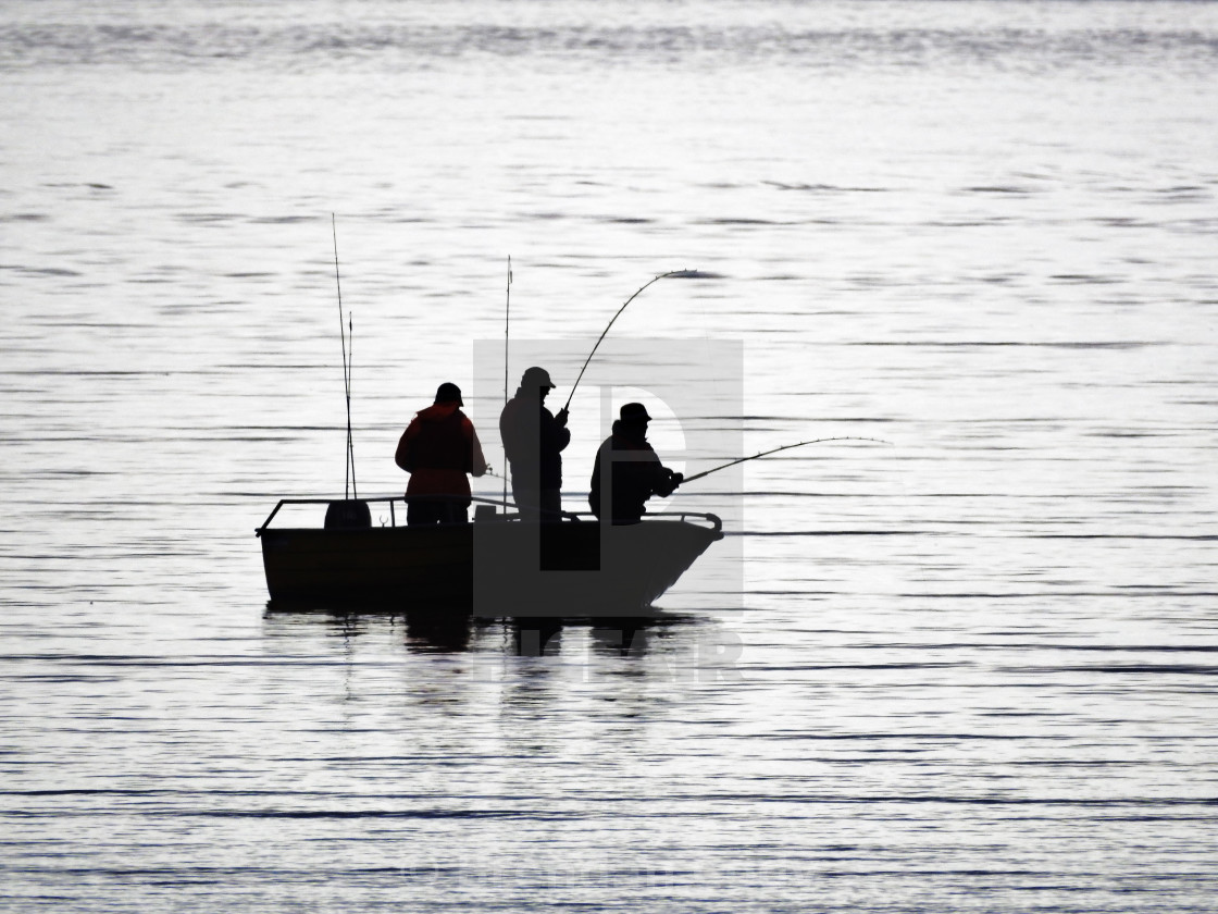 "Fishing Silhouette (Arctic Circle)" stock image