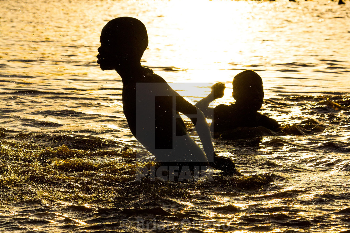 "Swimming time" by Brian Otieno - $1,521.37 "Swimming time" stock image