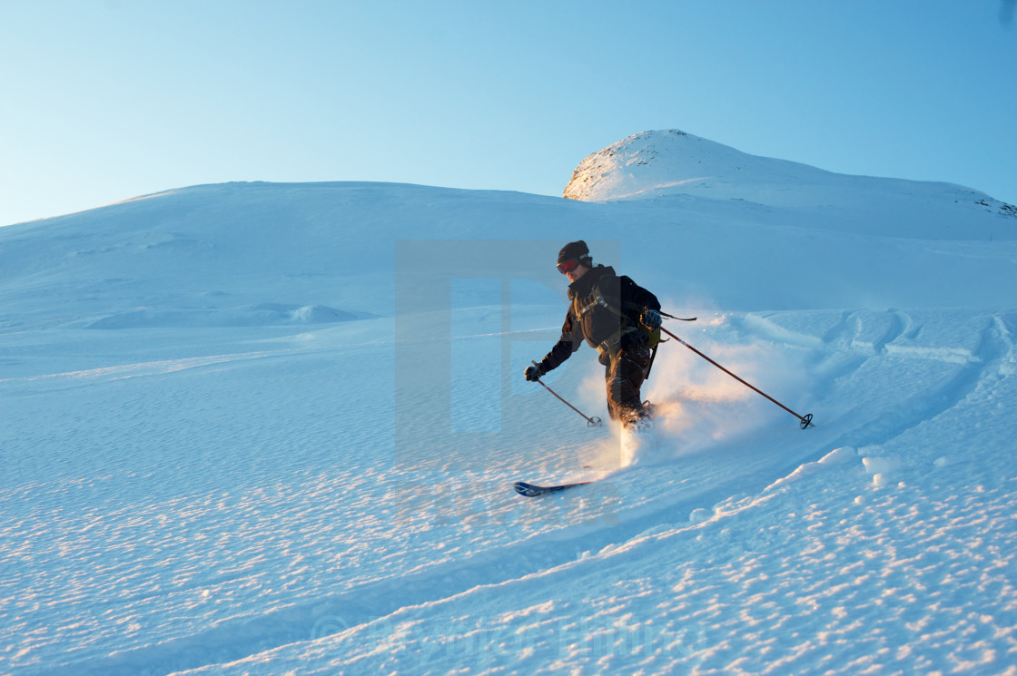 "skiing down mountain" stock image