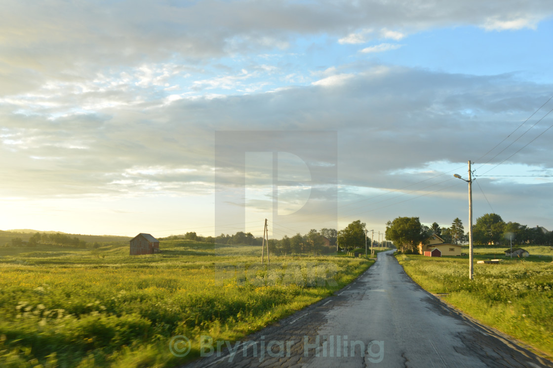 "Road through green landscape" stock image