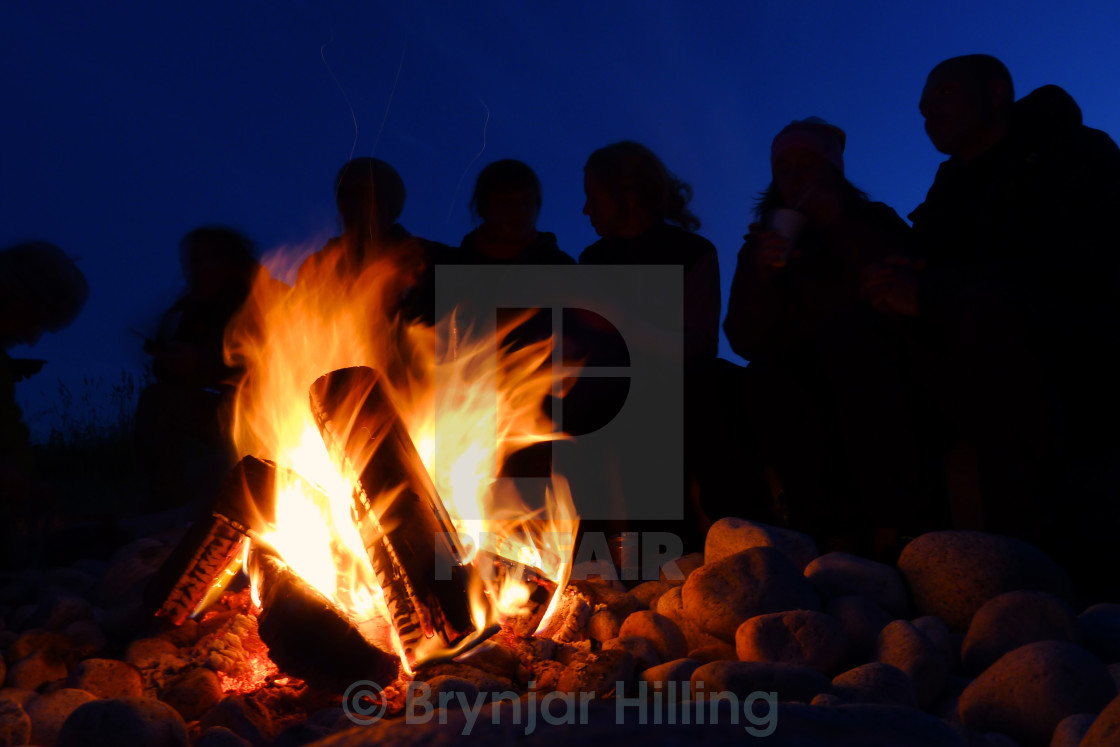 "Fire with people around" stock image