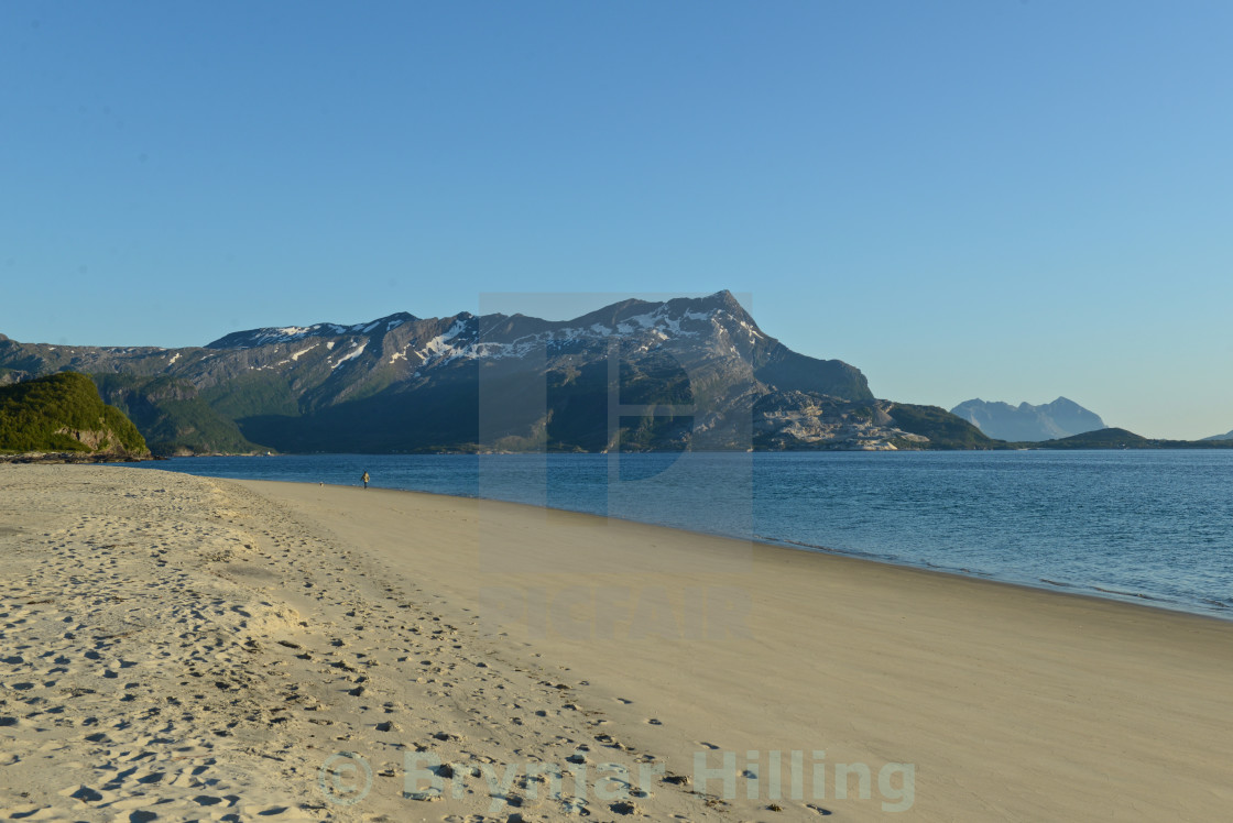 "Beach with mountains in background" stock image