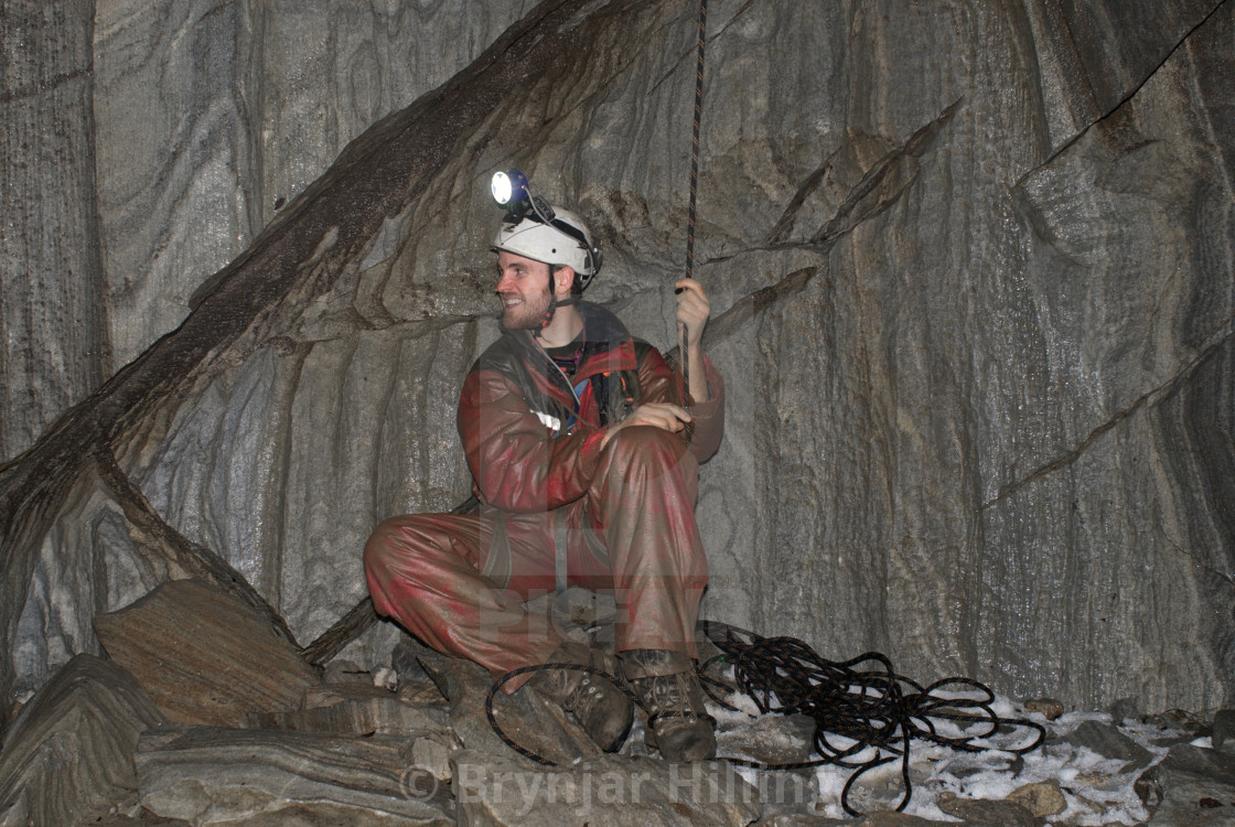 "Caving in wet cave" stock image