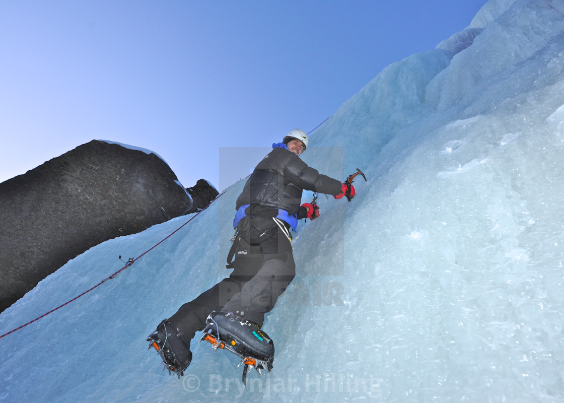 "Ice climbing in the arctic" stock image