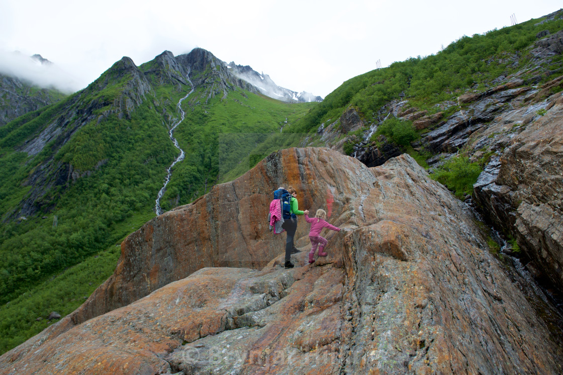 "Woman and girl heading up the mountains" stock image