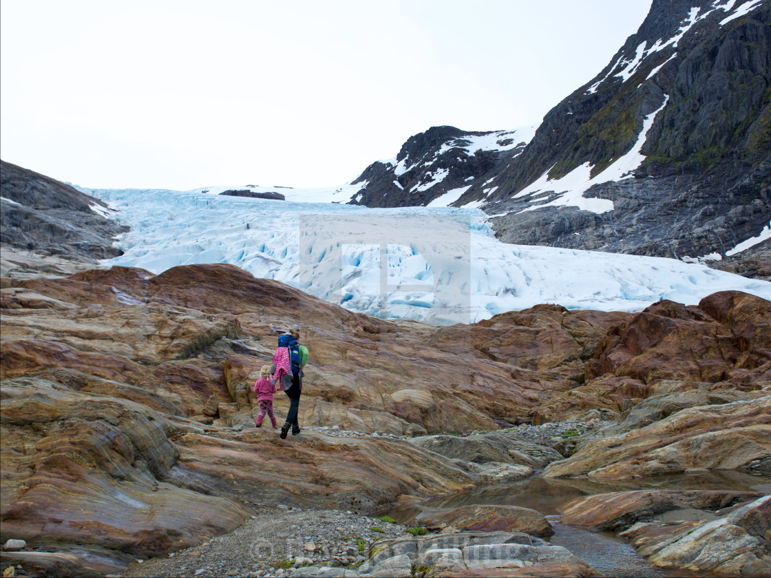 "Tourists heading for a glacier" by Brynjar Hilling - $15.44 "Tourists heading for a glacier" stock image