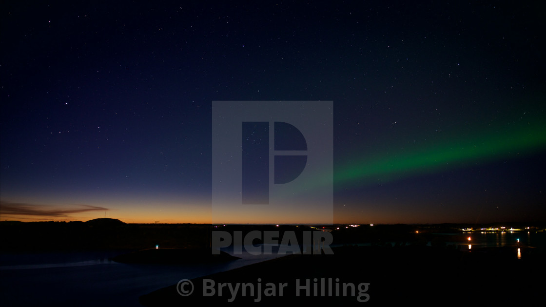 "Northern Lights over island" stock image