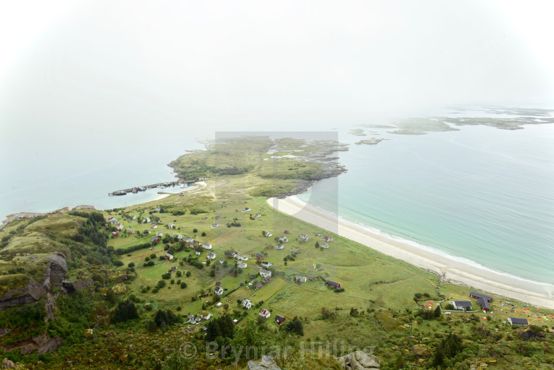 "Houses on a green island seen fram the top" stock image