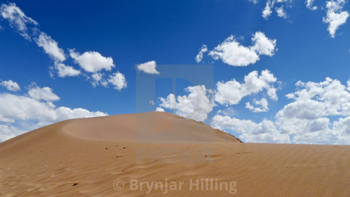 "Sand dune and blue skies" stock image