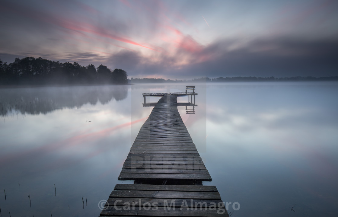 "Jetty by the lake" by Carlos M. Almagro - £14.88 "Jetty by the lake" stock image