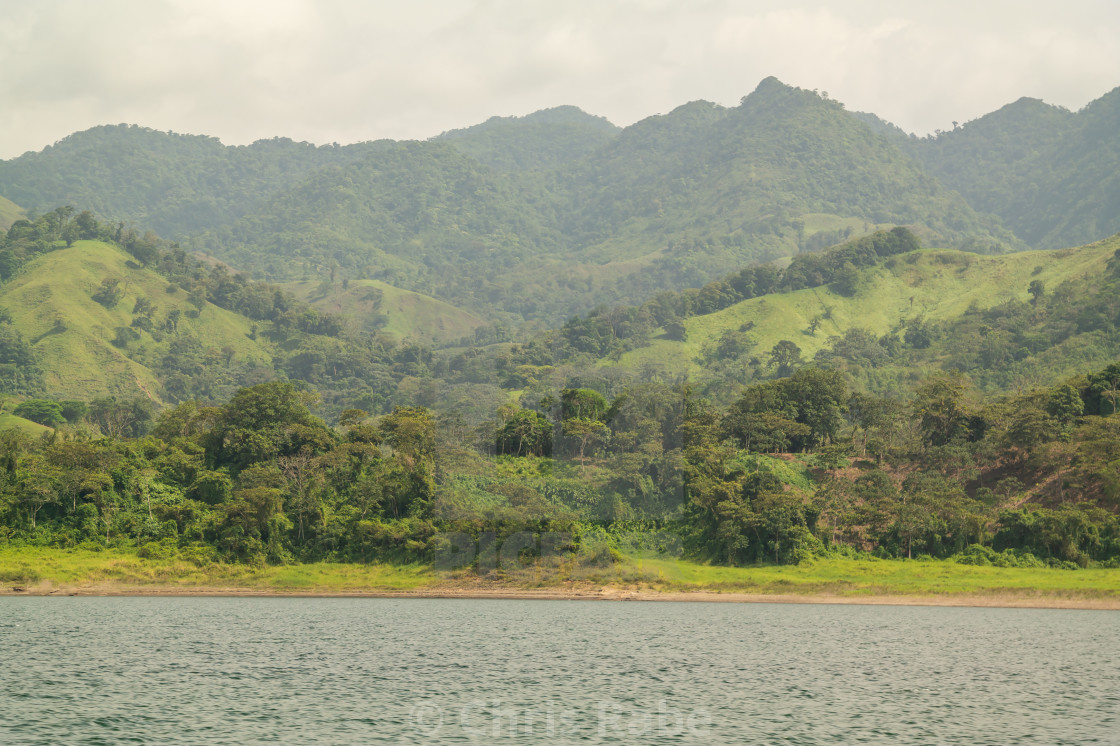 "Lake arenal and surrounding rainforest in the Alajuela region of Costa Rica" by Chris Rabe - $12.57 "Lake arenal and surrounding rainforest in the Alajuela region of Costa Rica" stock image