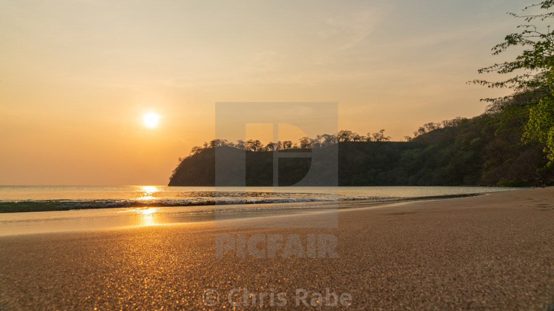 "Sun going down at dusk over the Pacific Ocean in the Guancaste province in..." by Chris Rabe - $12.63 "Sun going down at dusk over the Pacific Ocean in the Guancaste province in..." stock image