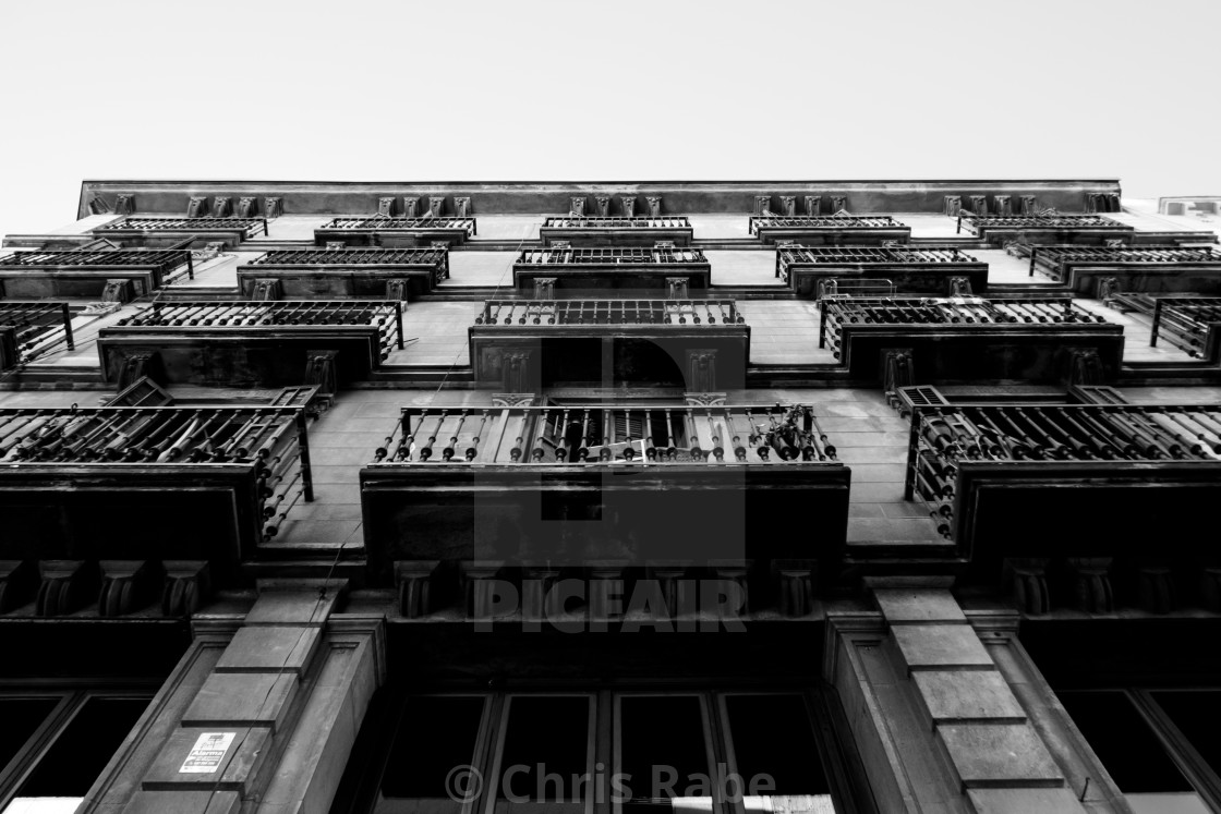 "An upward view of the balconies of a block of flats in the gothic quarter in..." stock image