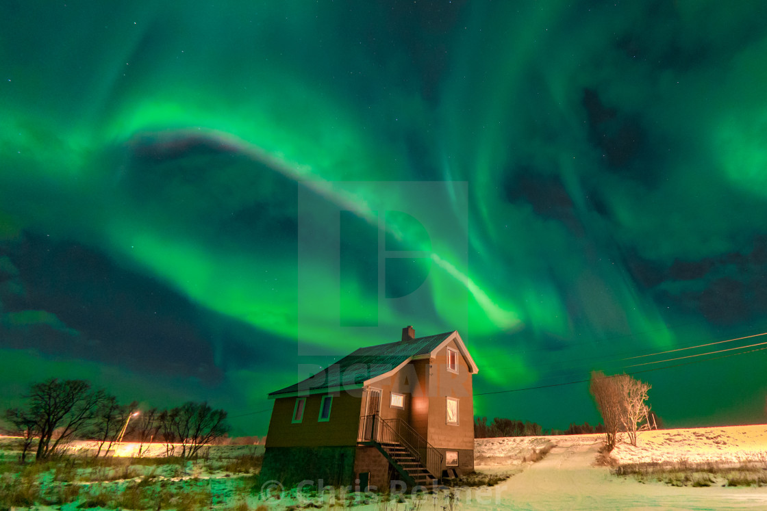 "Northern lights above an old farm house" stock image