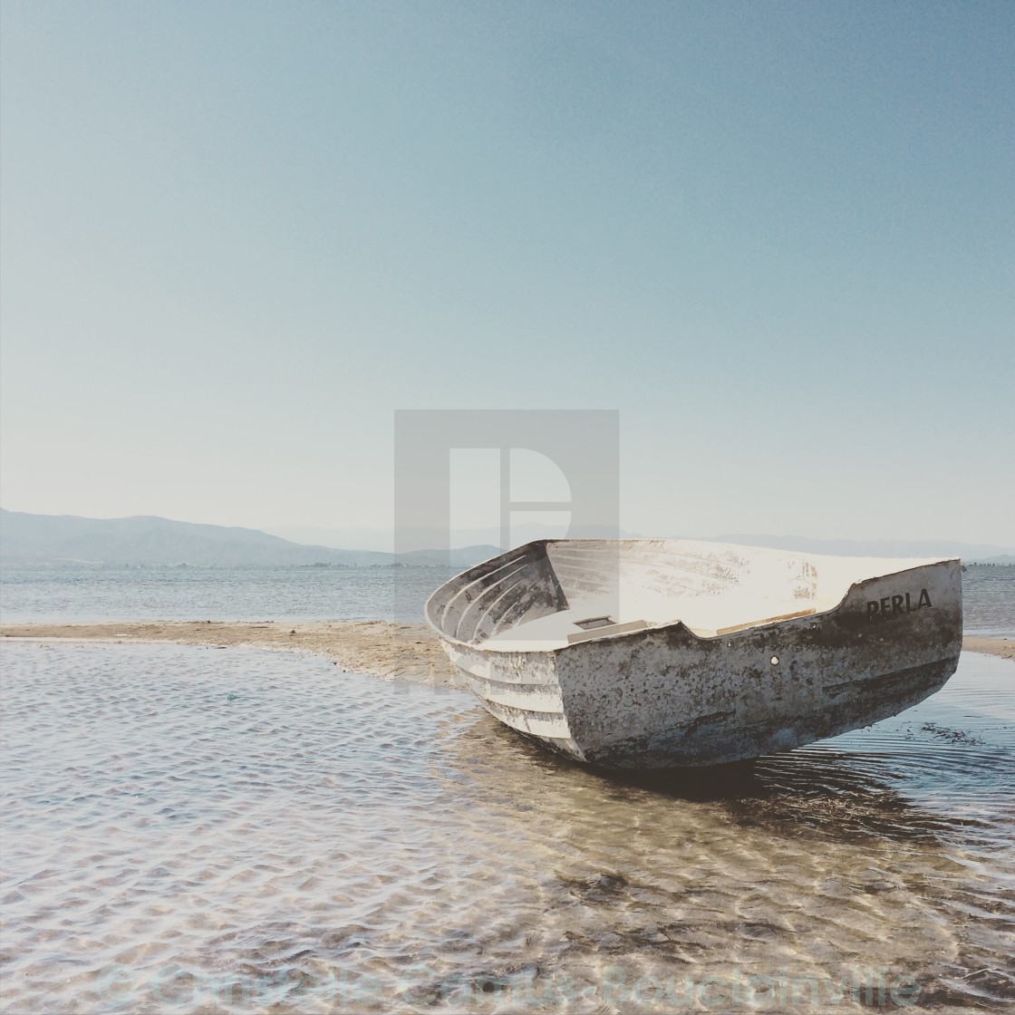 "boat on the shore" stock image