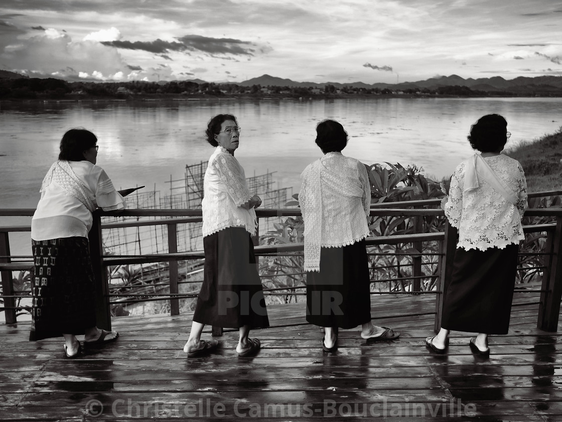 "4 women by the Mekong river" by Christelle Camus-Bouclainville - $46.29 "4 women by the Mekong river" stock image
