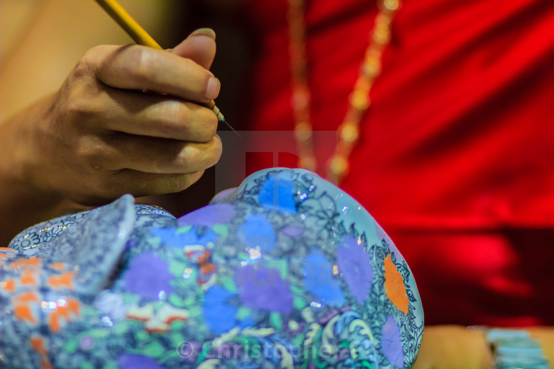Close Up Thai Woman Artist In Red Thai Style Dressed Is Painting