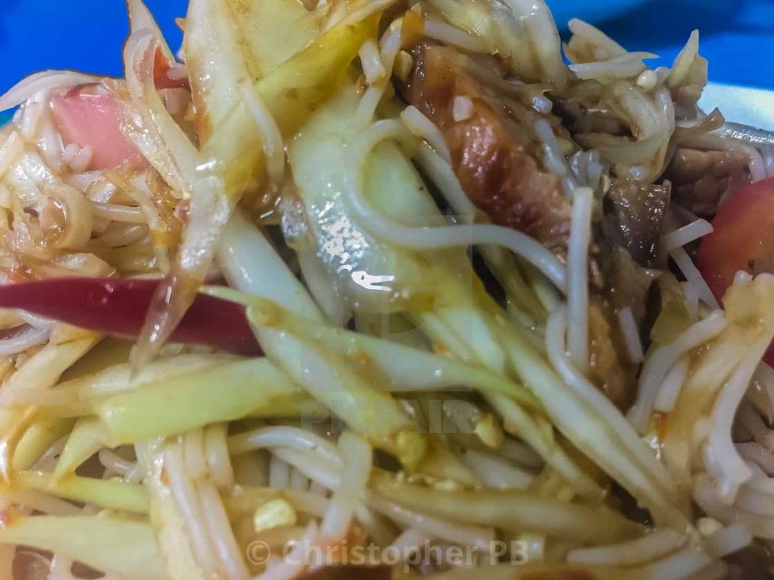 Green Papaya Salad Also Known As Som Tam A Spicy Salad Made From