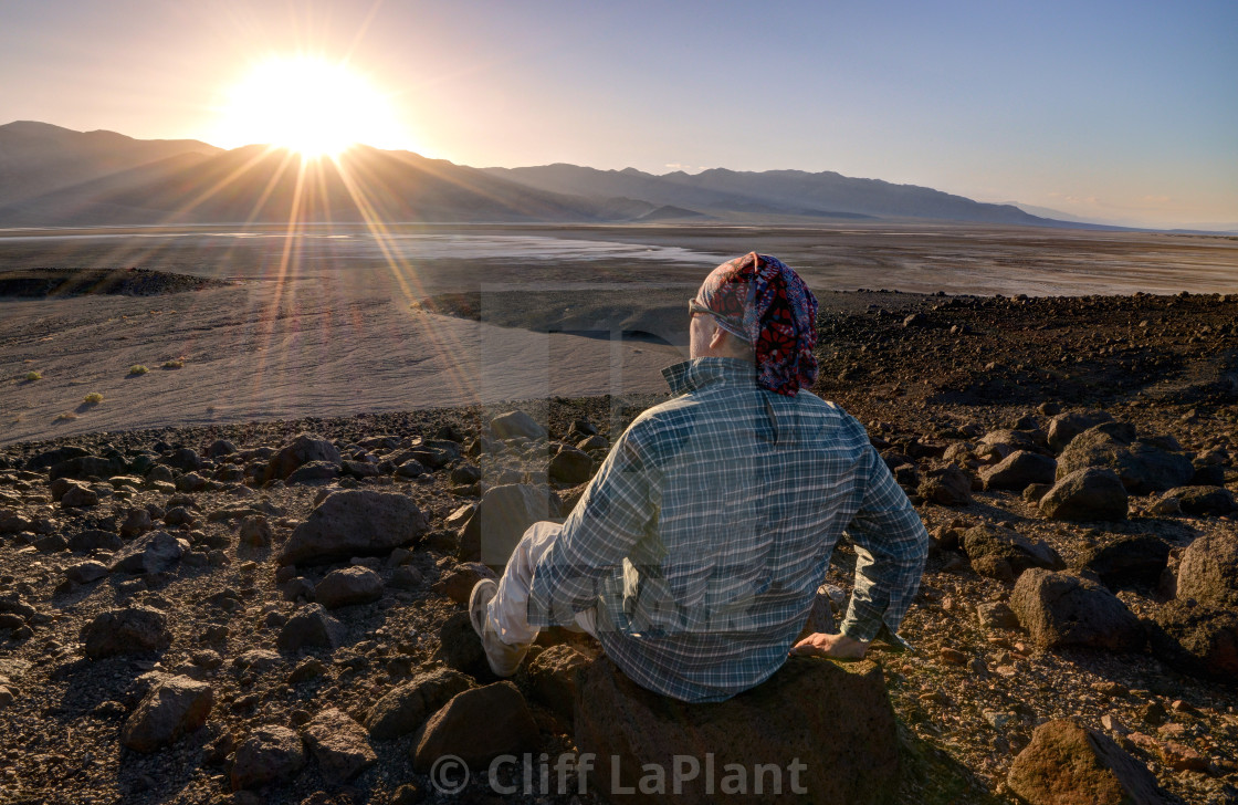 "Watching the Setting Sun in Badwater" stock image