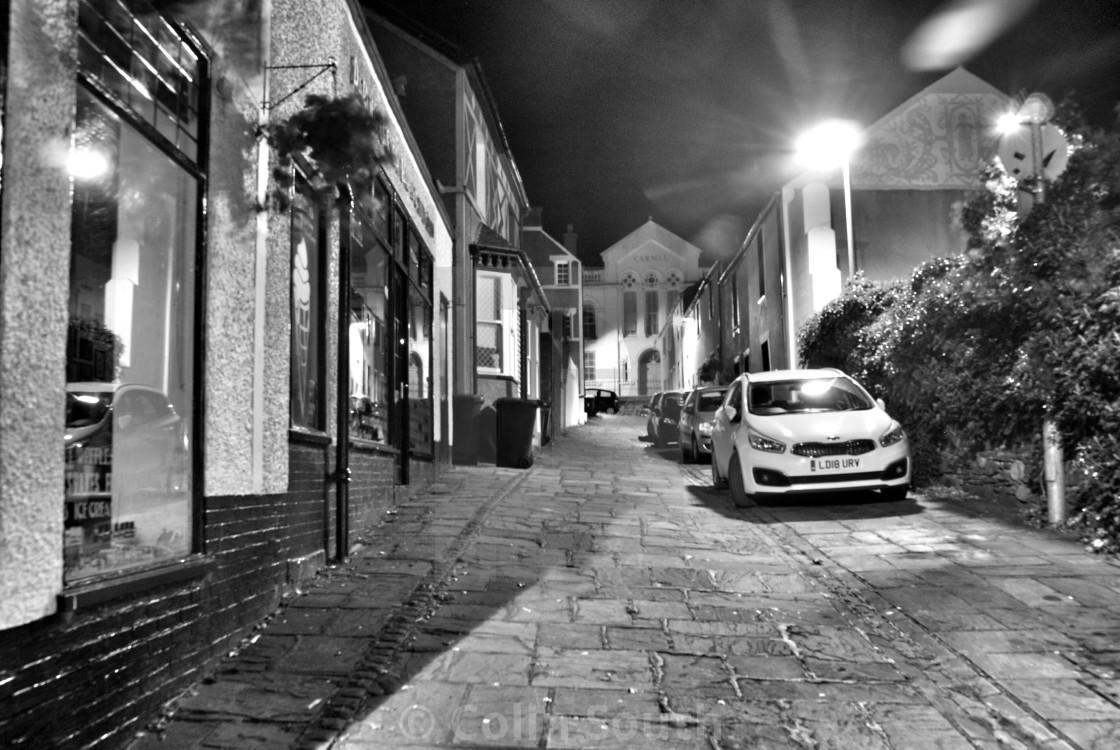 "Night time side street, Conwy, North Wales" stock image