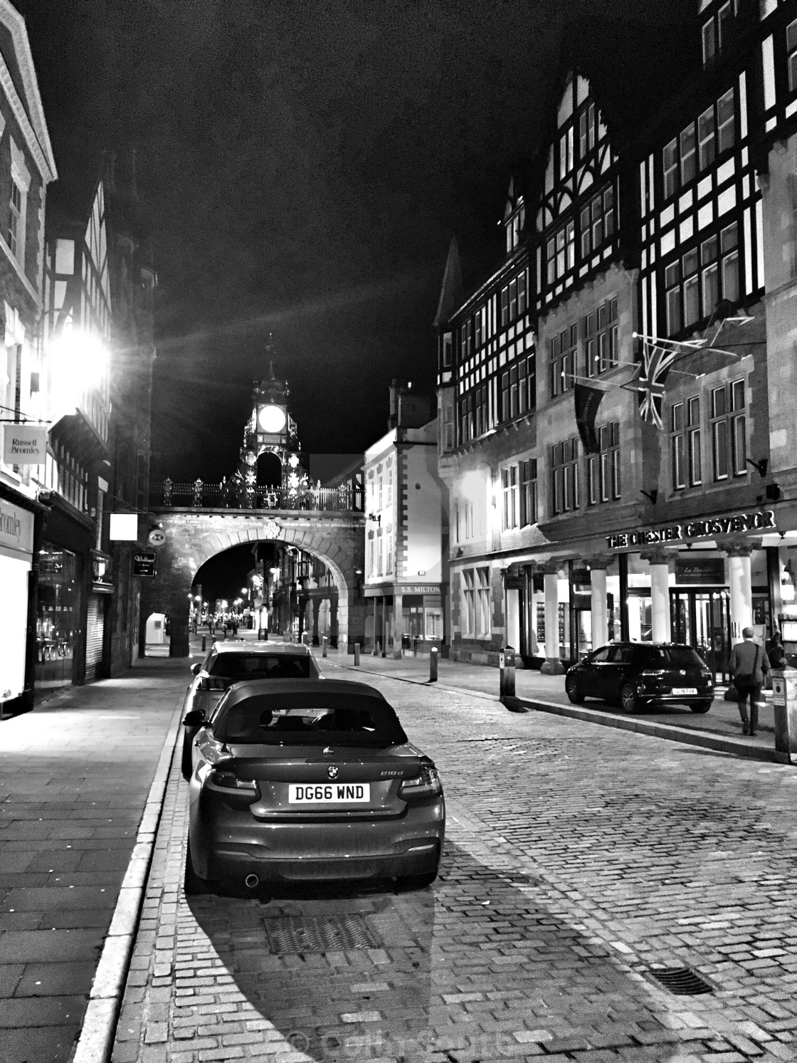 "Grosvenor Hotel, and the Eastgate Clock Chester, By night." stock image