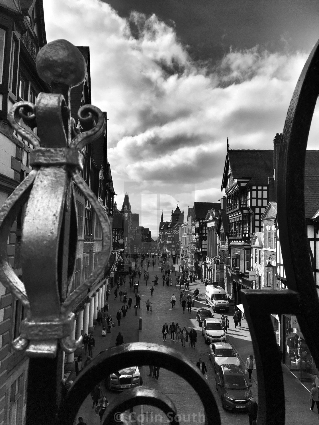 "Eastgate Street, Chester. through the railings." stock image