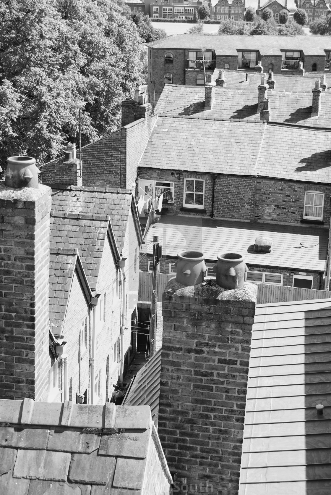 "Chimney pots and back yards." stock image