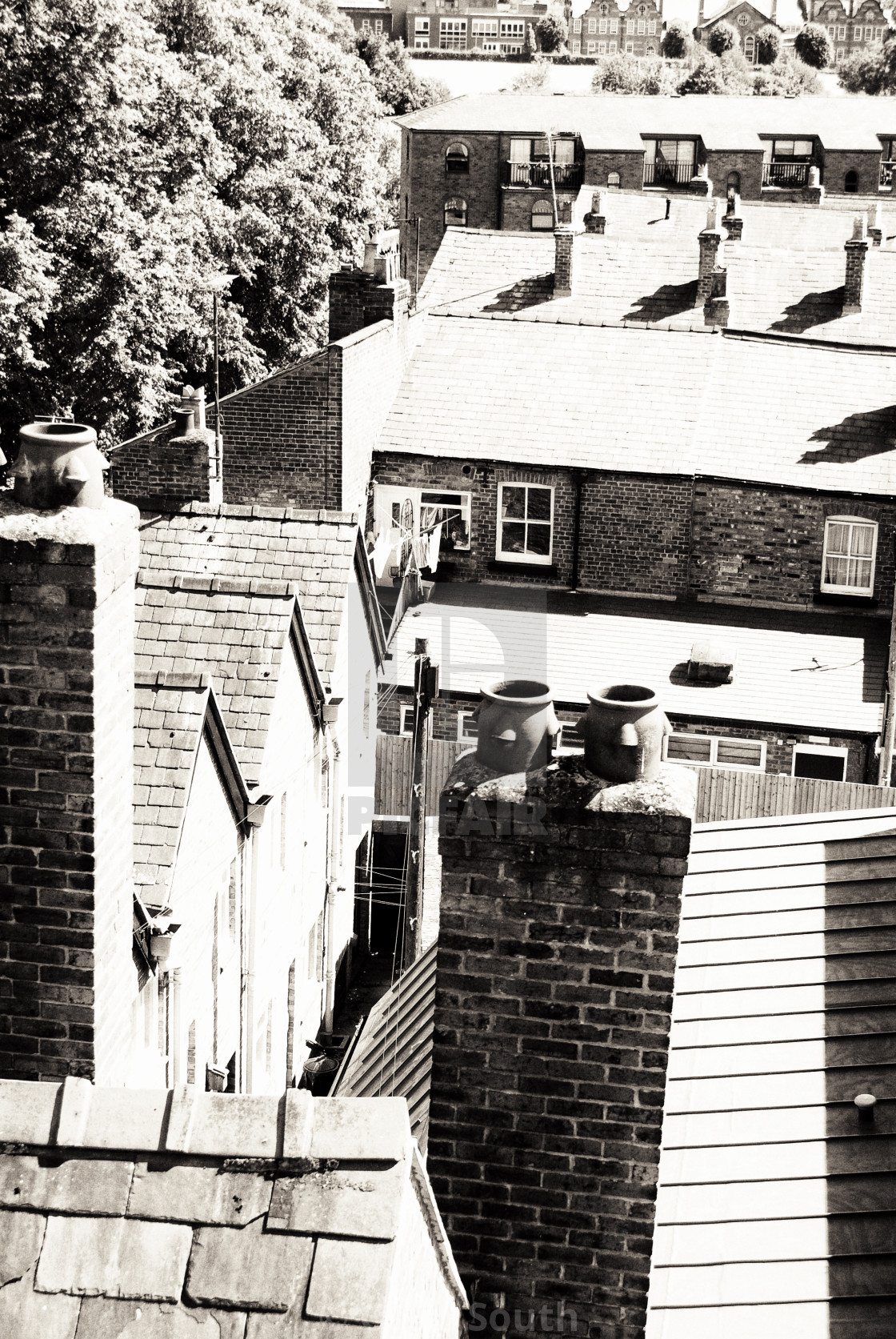 "chimney pots and back yards. (noir)" stock image