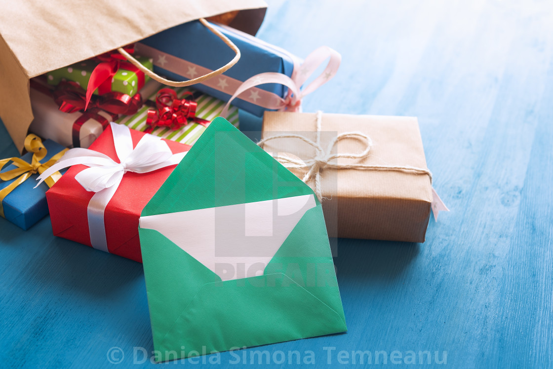 Opened Envelope And Bag Full Of Gifts License Download Or Print