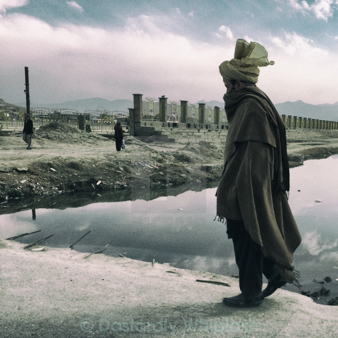 "Wrapped up against the wind" stock image