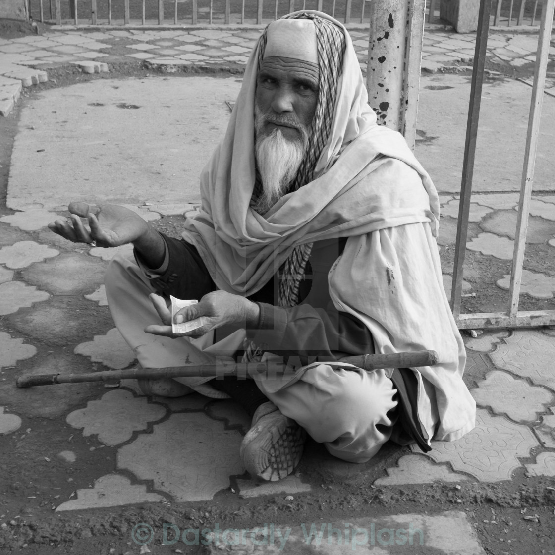 "Beggar looking for help" stock image