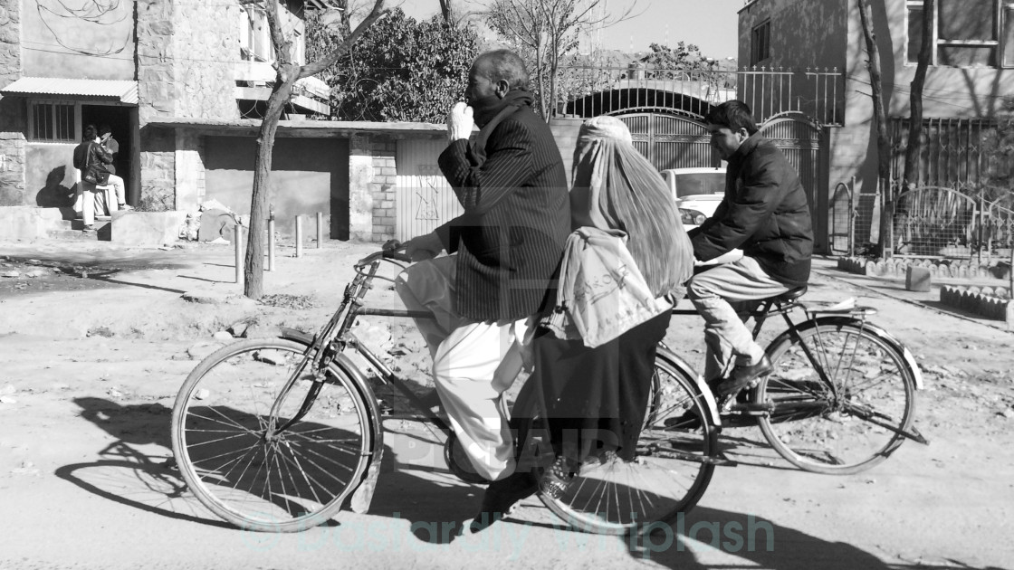 "Side saddle, two up." stock image